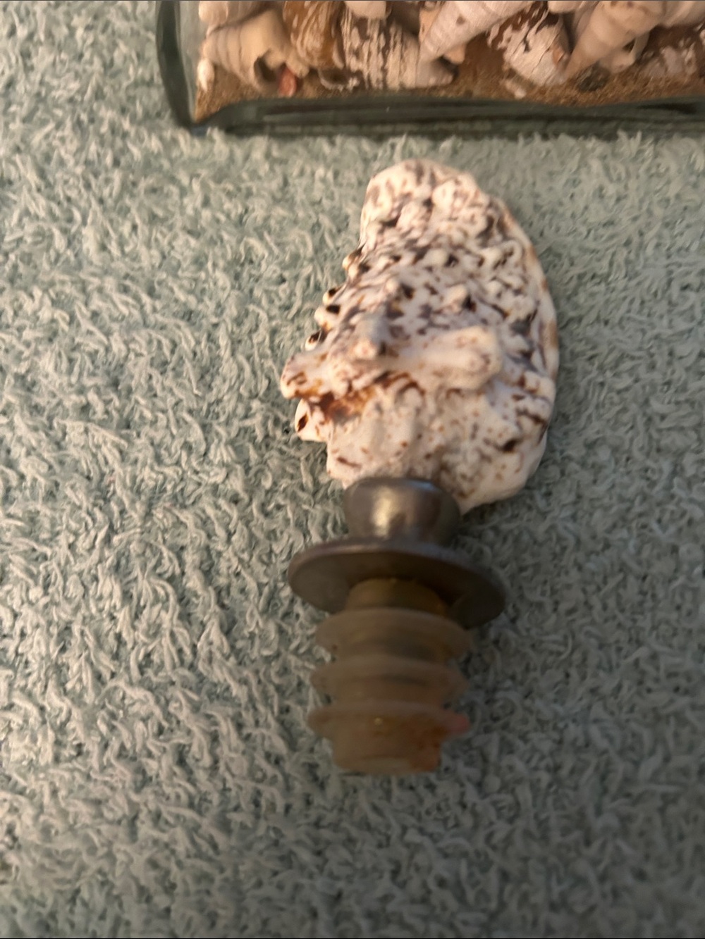 Odd shaped Bottle containing seashell with shell stopper & seashell wine stopper - Picture 8 of 11